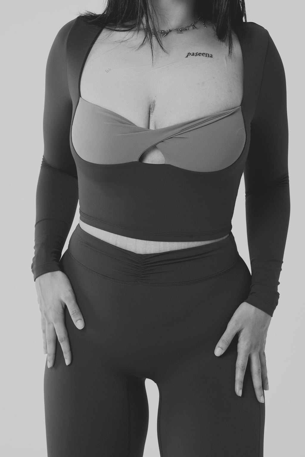 SHE. (top).